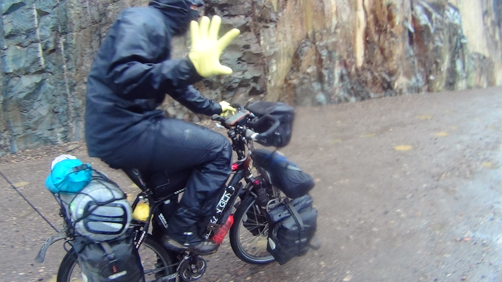 Yellow rubber gloves over inner gloves. Excellent for keeping hands dry. Why didn't I do that before? A bout of cold afternoon rain forces on full wet weather gear.